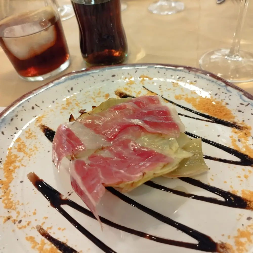 Alcachofas confitadas con jamón ibérico